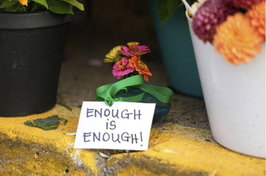 Minneapolis sign at memorial site for shooting victims