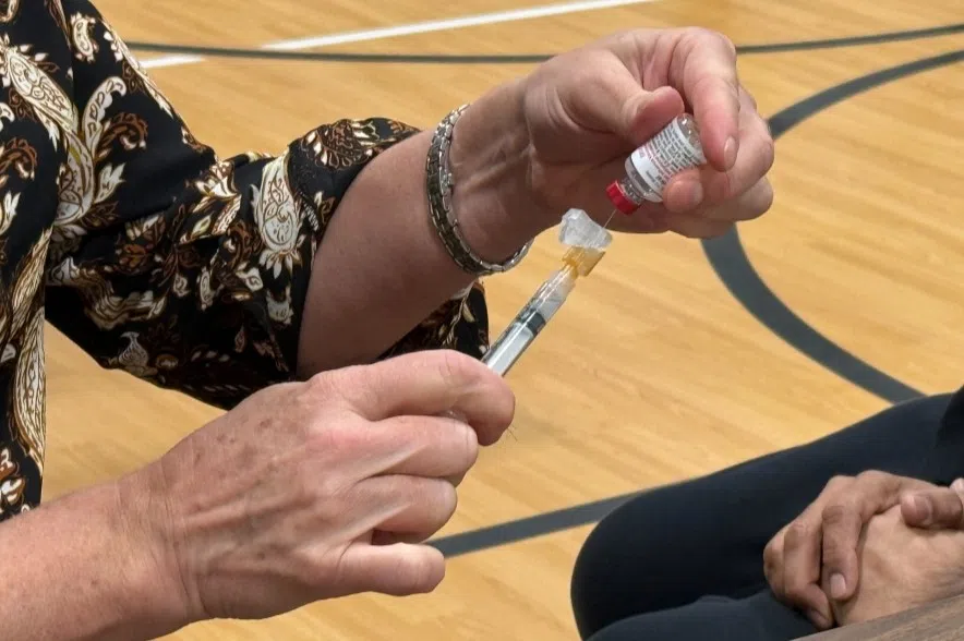 Person getting flu vaccine.