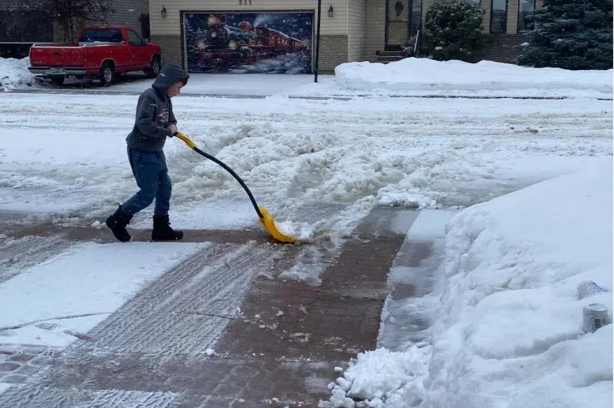 guy shoveling snow