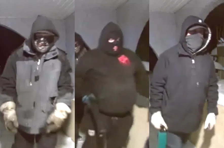 The three suspects are all believed to be male. One suspect was wearing a patterned face covering, the second suspect was wearing a black hoodie with a red logo and the third suspect was wearing a grey face covering. (Saskatchewan RCMP/submitted)