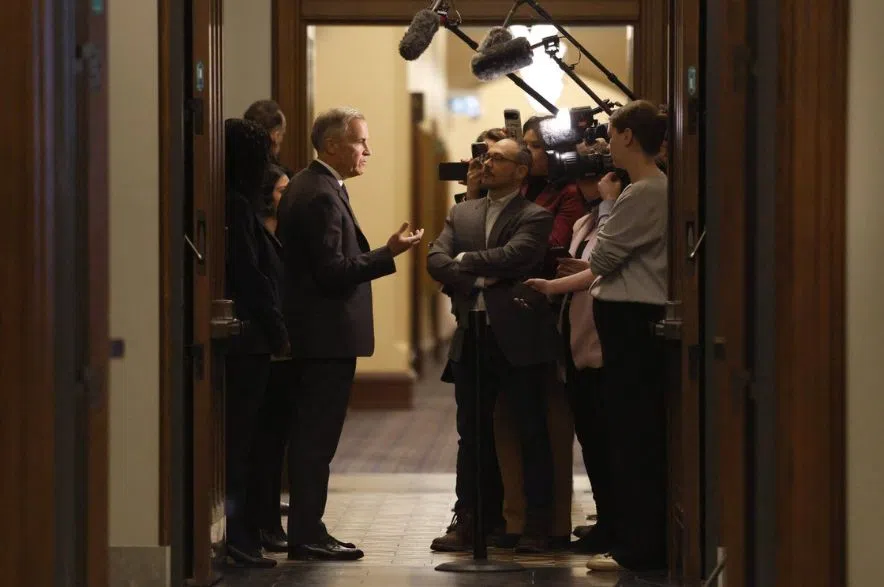 Carney talks to press