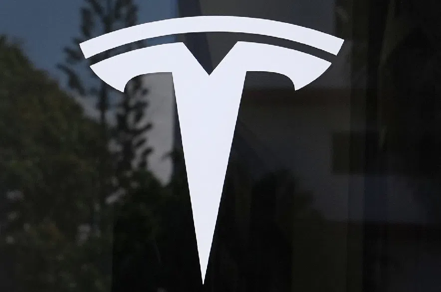 The Tesla logo is displayed at a Tesla dealership Thursday, Mar. 13, 2025, in Miami.