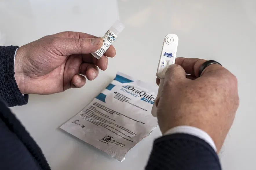 Dr. Sean Rourke, a Toronto-based clinical neuropsychologist and scientist at St. Michael's Hospital, holds a new HIV self-test in Toronto on Monday, Feb. 9, 2026.