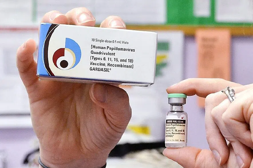 A nurse holds up a vial and box for the HPV vaccine, brand name Gardasil, at a clinic in Kinston, N.C. on Monday, March 5, 2012.