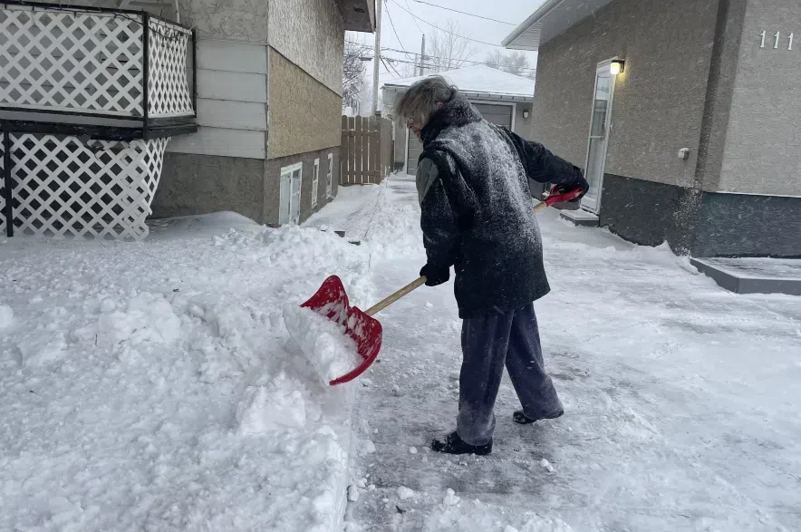 Penny Bell shoveling snow in Regina’s Glencairn neighbourhood.