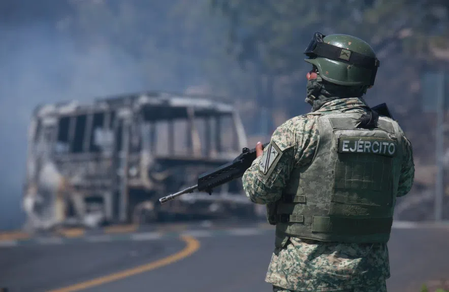 A solder stands guard in Mexico
