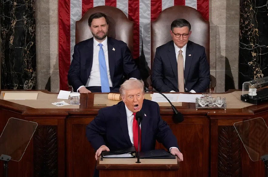 President Donald Trump delivers the State of the Union address to a joint session of Congress in the House chamber at the U.S. Capitol in Washington, Tuesday, Feb. 24, 2026, as Vice President JD Vance and House Speaker Mike Johnson of La., listen.