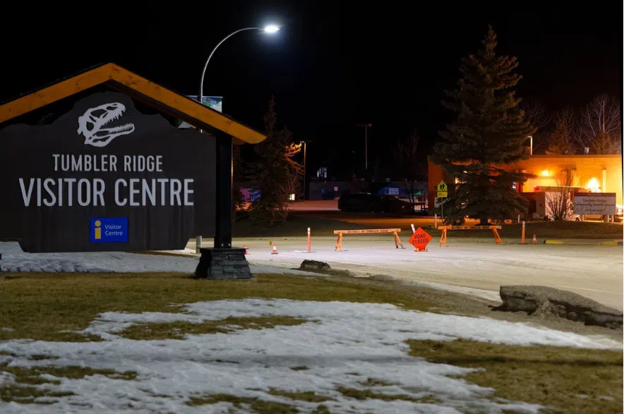 The road is blocked off before the Tumbler Ridge Secondary School in Tumbler Ridge, B.C. on Wednesday, Feb. 11, 2026.