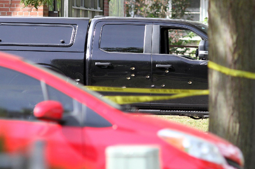 Bullet holes are pictured in the side of a pickup truck near the scene of a shooting that took place late Sunday evening near Sons of Jacob Synagogue in Belleville, Ont., on Monday, Sept. 21, 2026.