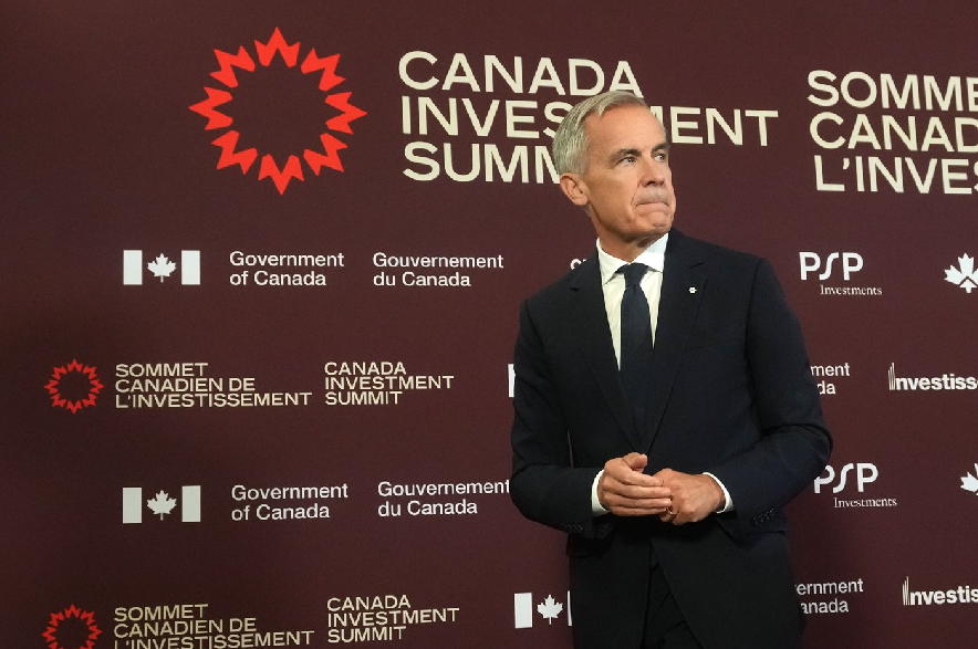 Prime Minister Mark Carney attends a news conference at the 2026 Canada Investment Summit in Toronto, on Tuesday, Sept. 15, 2026.