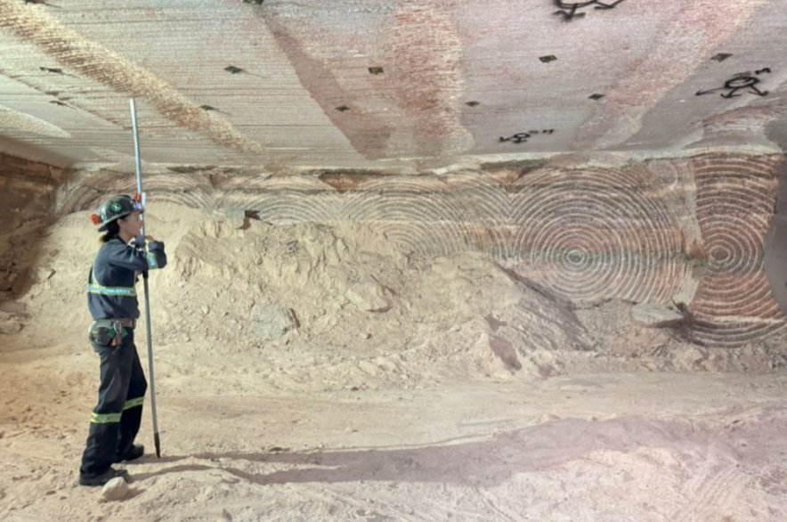 A worker stands in a potash mine in Allan, SK.