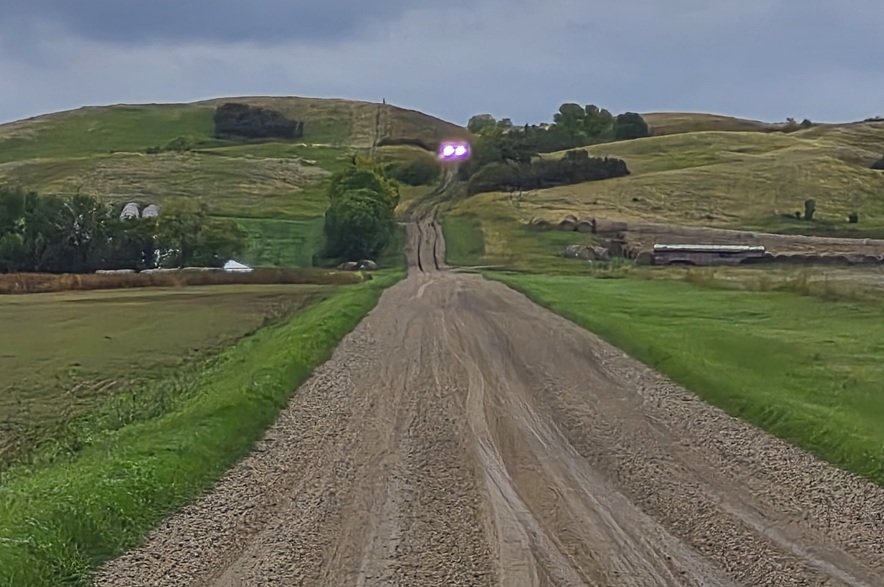 Emergency vehicles on the road to the area believed to be the site of the aircraft accident near Kisbey, Sask., Friday, Sept. 18.