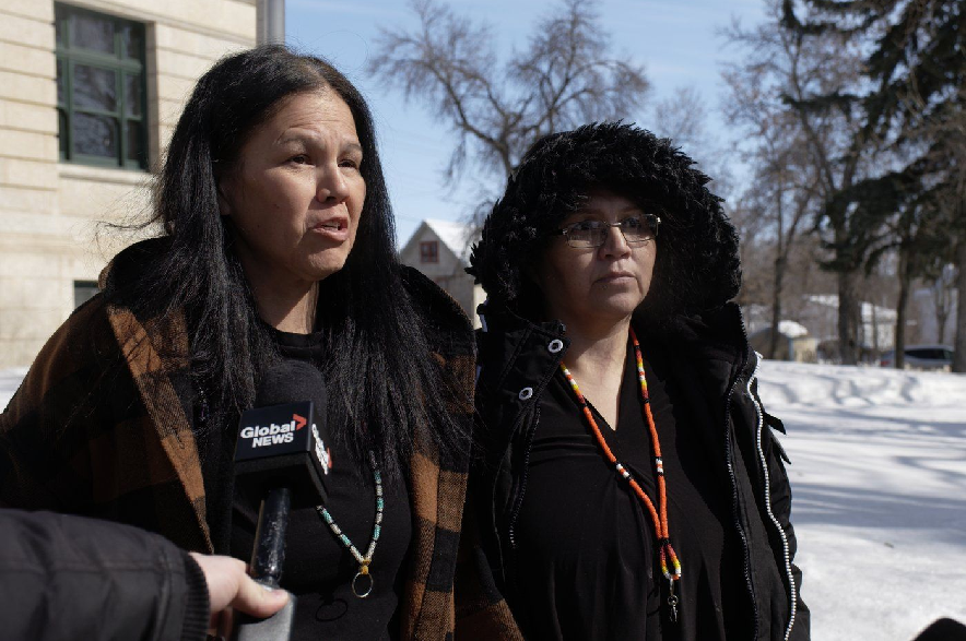 Odelia and Nerissa Quewezance, from left, speak to media outside Court of King's Bench in Yorkton, Sask., Monday, March 27, 2023.