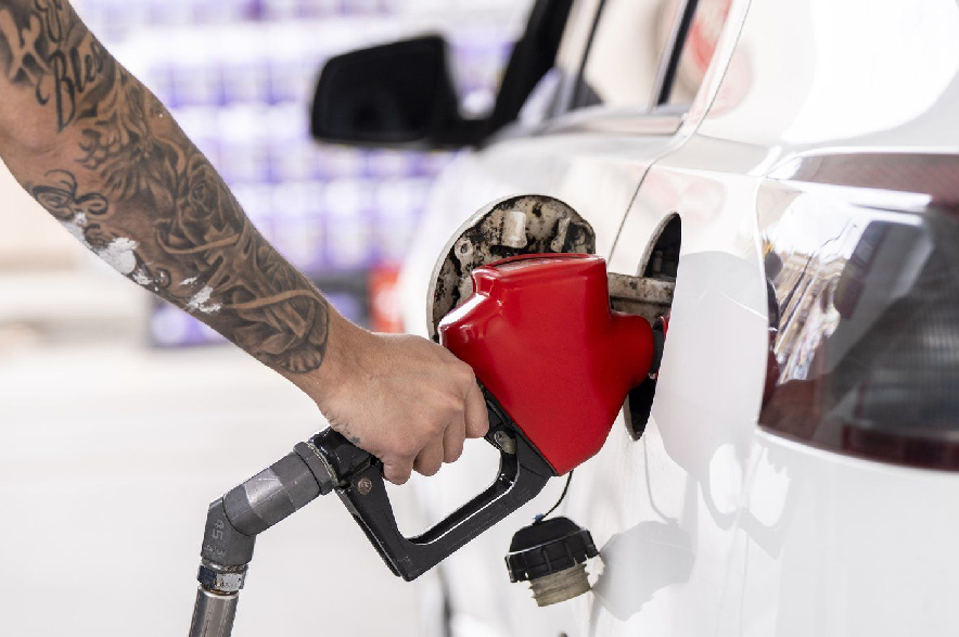 A person pumps gas in Montreal on Thursday, April 2, 2026.