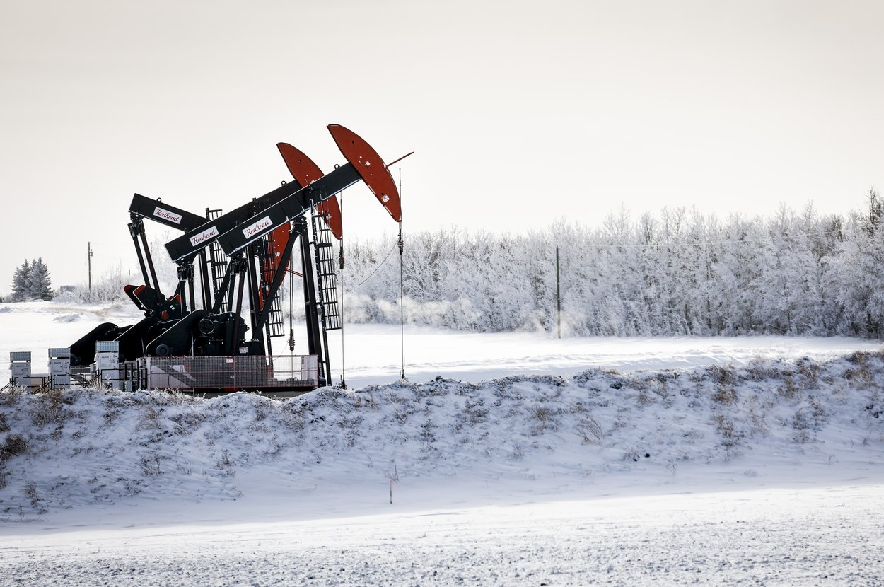 Pumpjacks draw out oil and gas on a frosty -25C day near Carstairs, Alta., on Monday, Feb. 3, 2025.