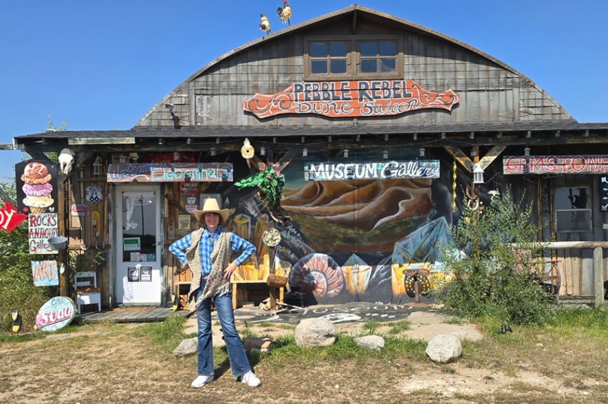 Reese McCallum in front of Pebble Rebel Dune Saloon.