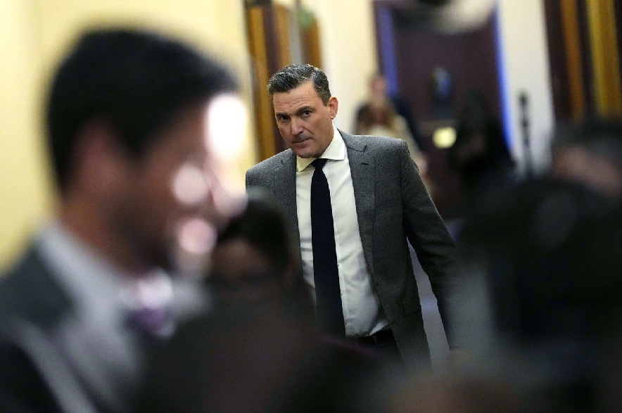 Minister of Artificial Intelligence and Digital Innovation Evan Solomon makes his way to a meeting of the Liberal caucus on Parliament Hill on Wednesday, Oct. 21, 2026.