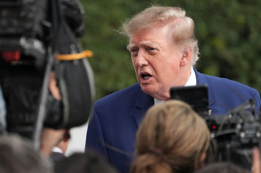 U.S. President Donald Trump speaks to reporters.