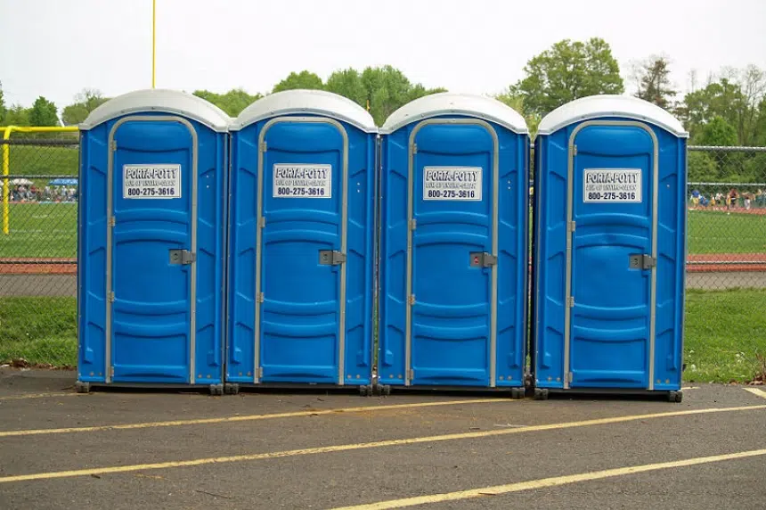 2 youth warned after tipping porta-potty with woman inside