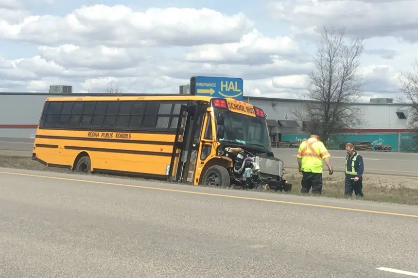 Pickup truck rolls on Ring Road, school bus involved