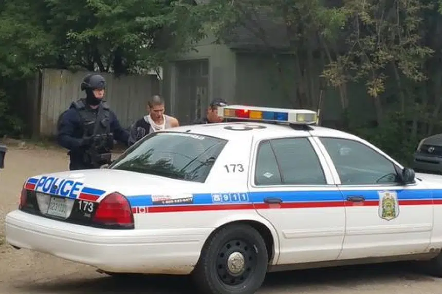 Police surround home in Saskatoon