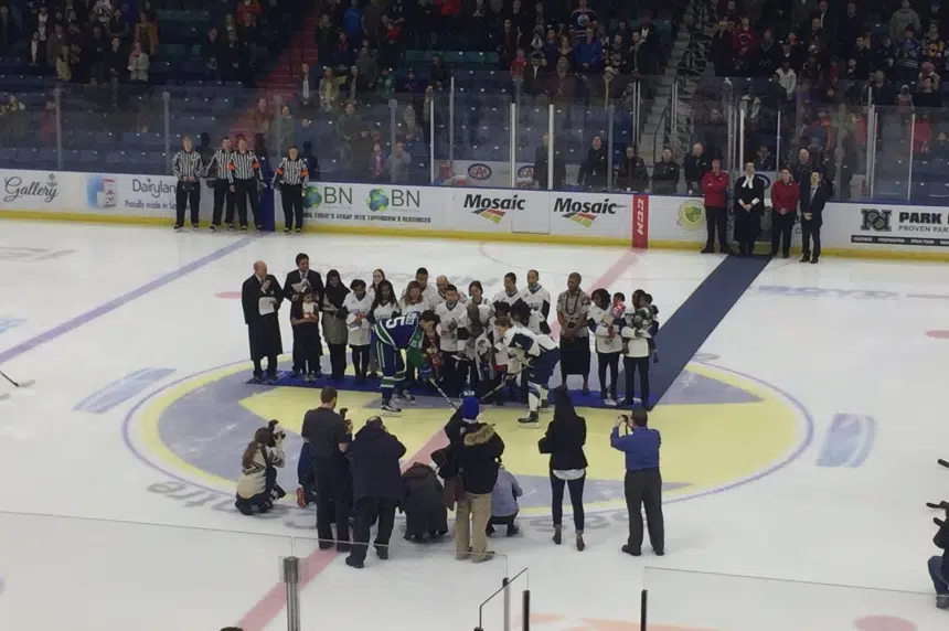 New Canadians take citizenship oath at Blades game