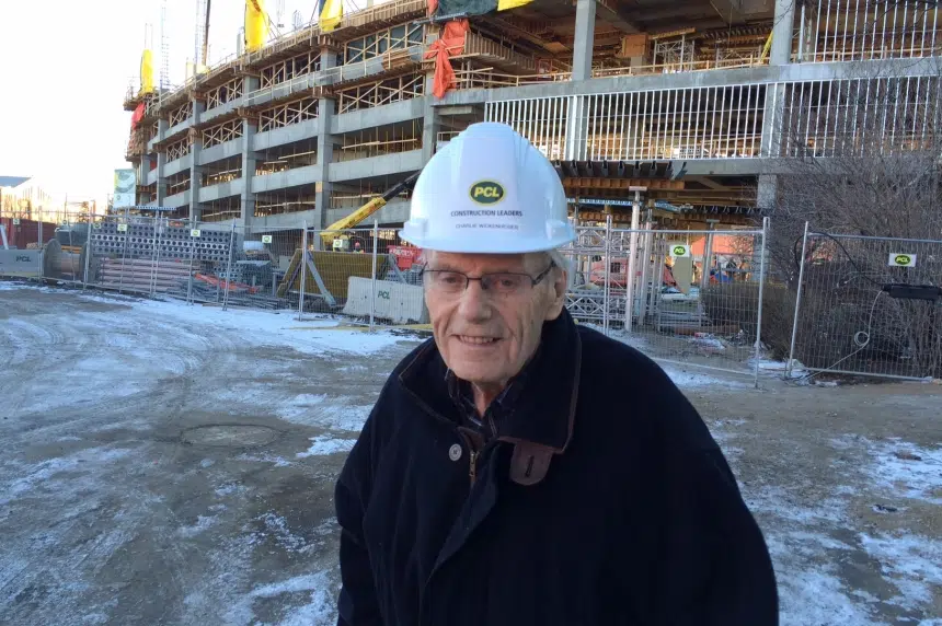 Part of the team: Regina senior keeps an eye on construction of new stadium