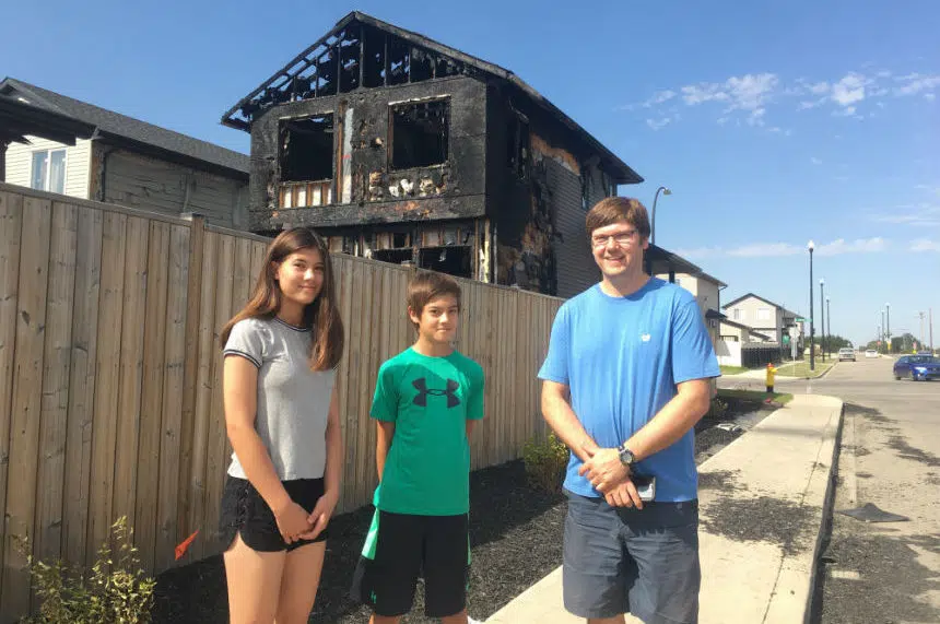 Two kids run toward danger to warn neighbours of house fire