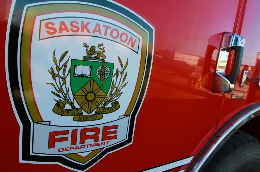 Backyard fire sparks garage blaze in Saskatoon