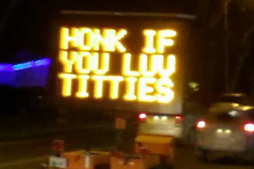 City of Regina sign vandalized: "honk if you luv..."