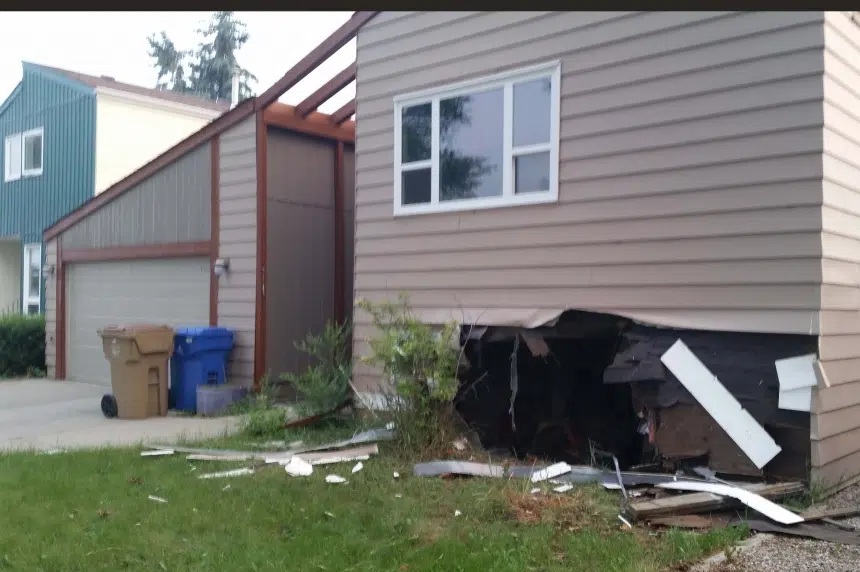 PHOTOS: Man charged after car crashes in Regina basement