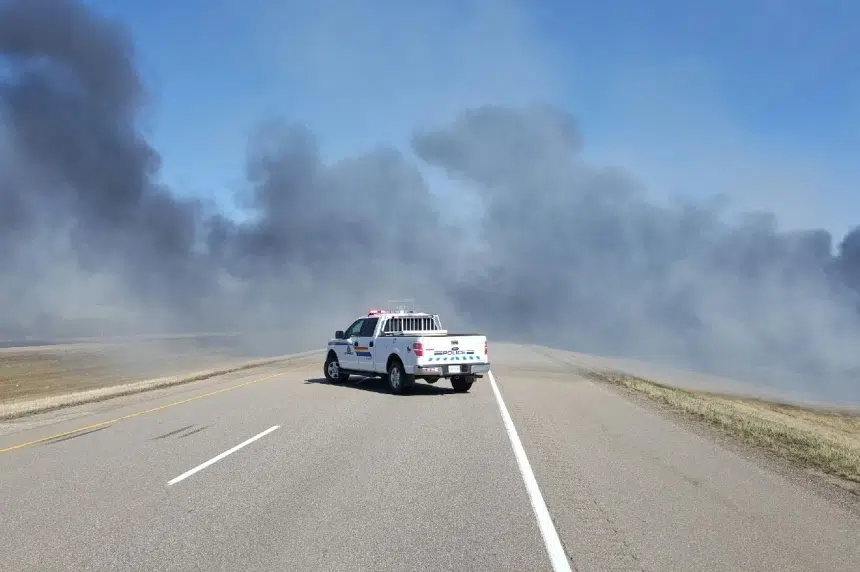 Grass fire jumps Yellowhead Highway, causes traffic delays