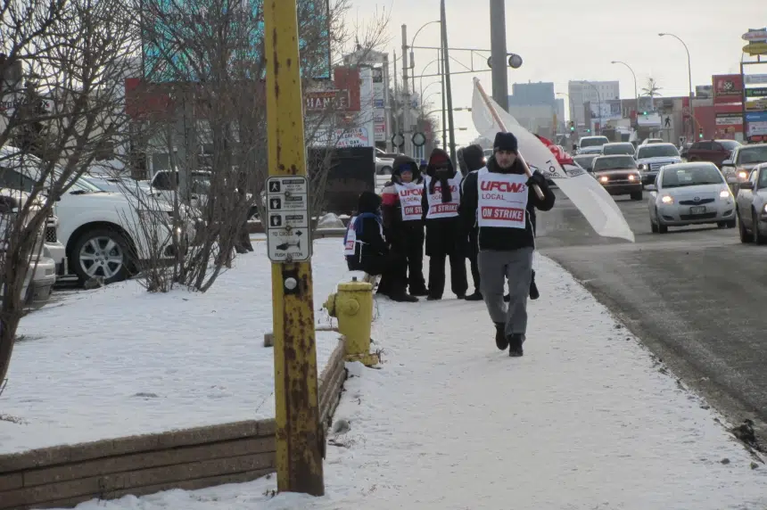Some workers strike outside Regina hotel