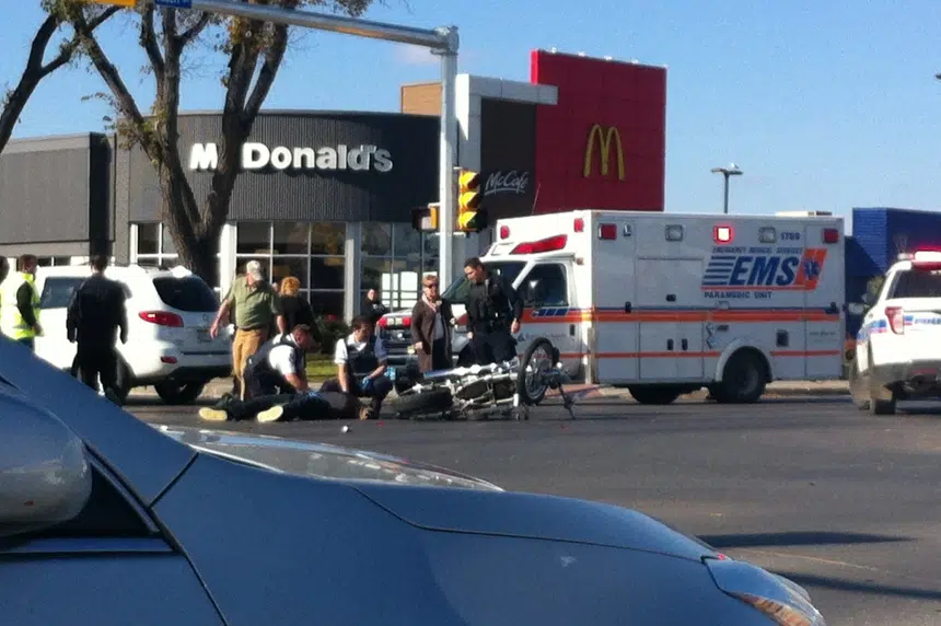 Motorcycle driver sent to hospital following crash at Albert and Dewdney
