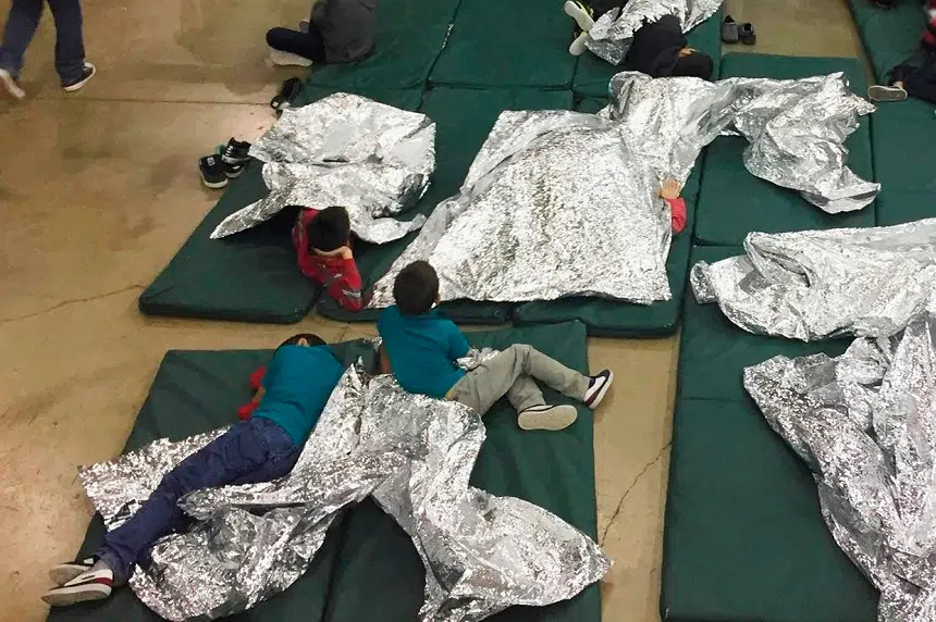 Immigrant kids seen held in fenced cages at border facility