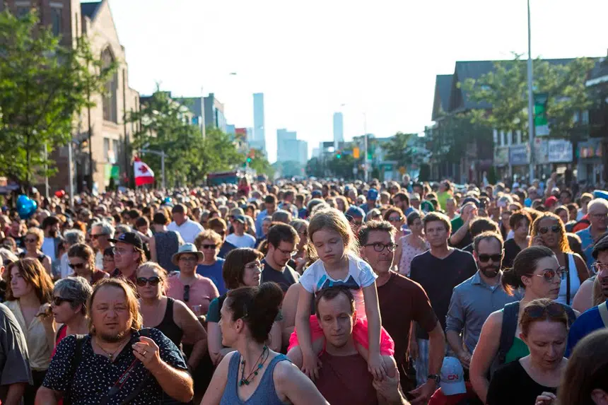 Hundreds pack Toronto’s Greektown neighbourhood for shooting vigil