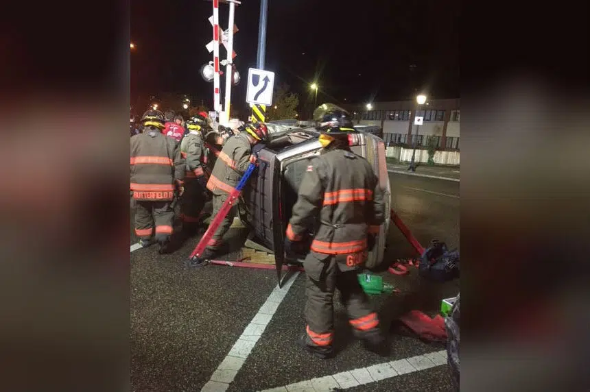 Saskatoon fire crews rescue 2 people trapped in flipped SUV
