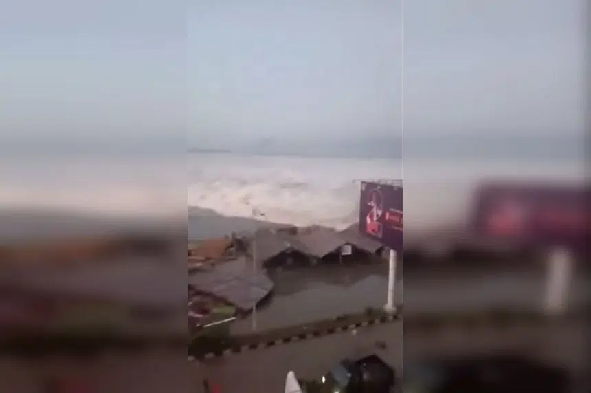Tsunami sweeps away homes on Indonesian island of Sulawesi