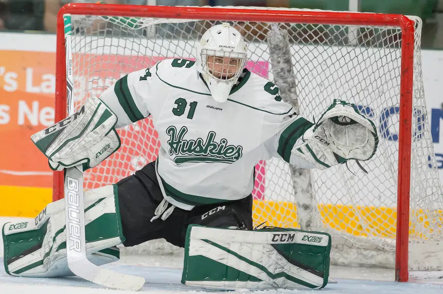 Hockey Huskies withstand Dinos to win thrilling home-opener