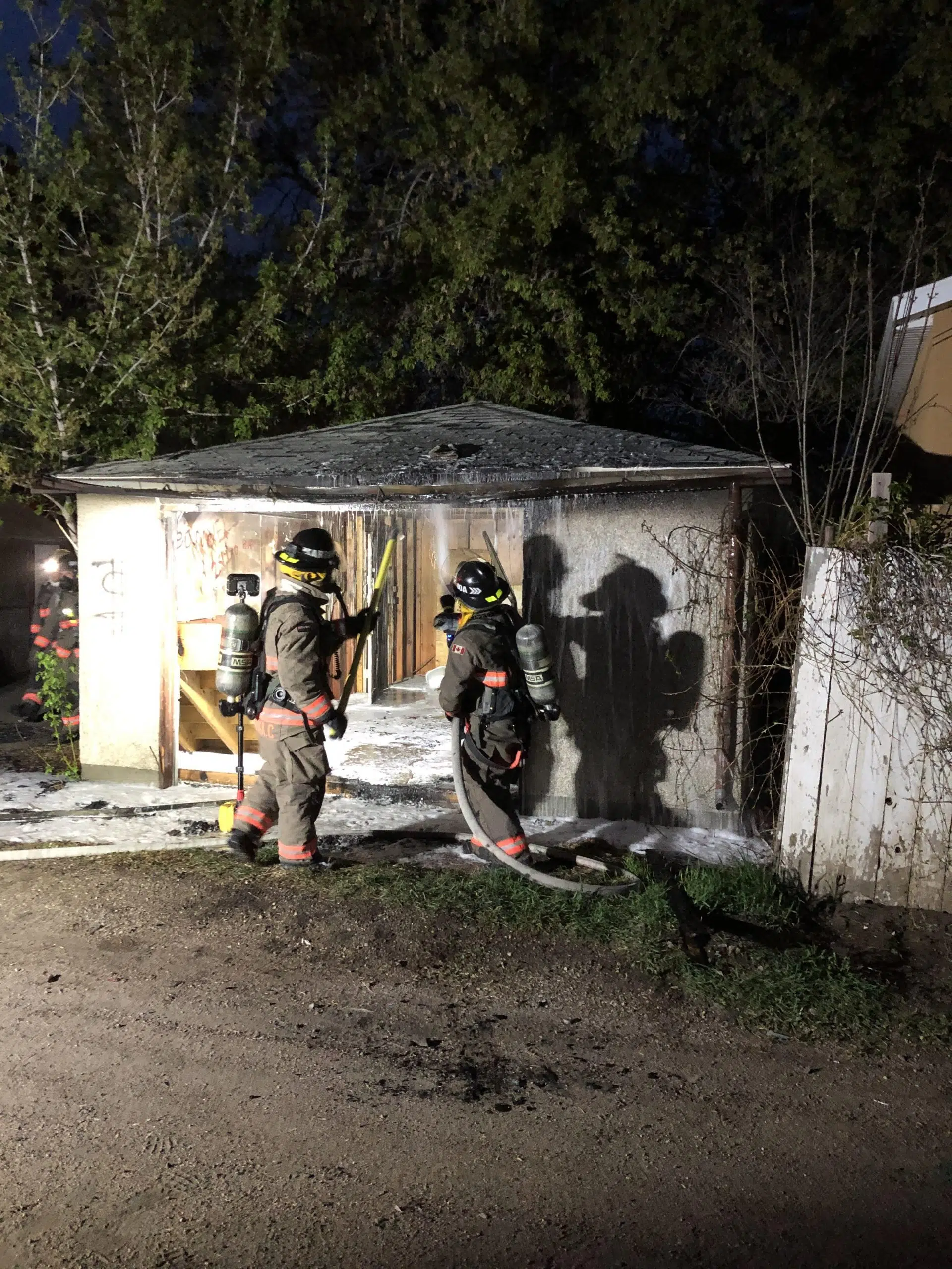 No injuries reported in house, garage fires Thursday night