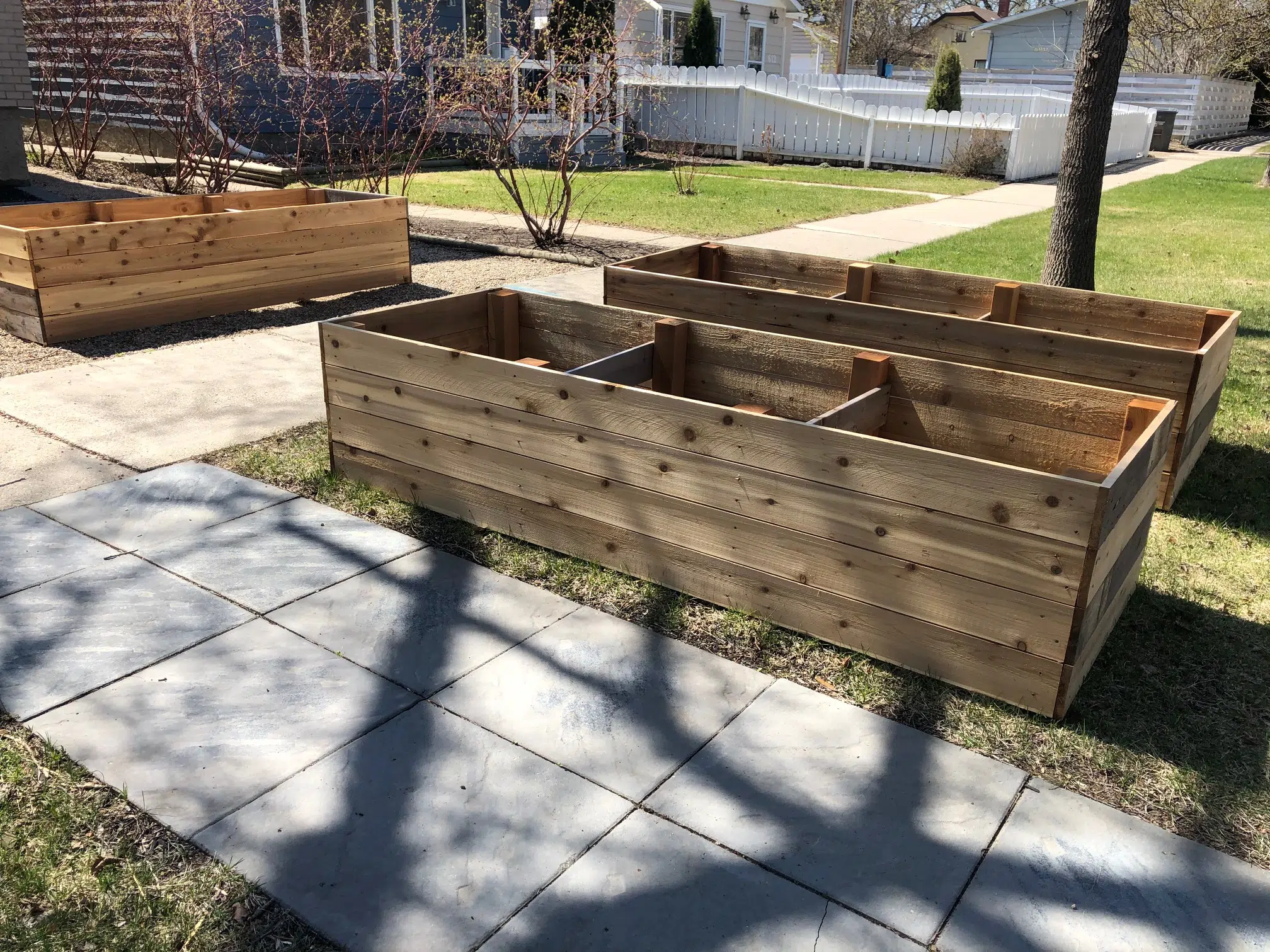 Saskatoon couple puzzled over city bylaw citation for boulevard planter boxes