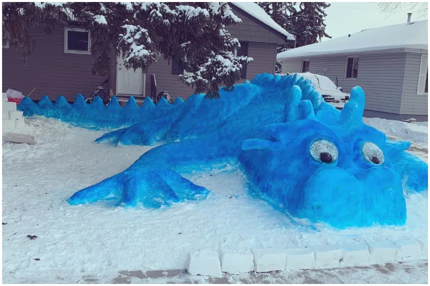 Saskatoon woman builds large snow dragon in hopes of making people smile