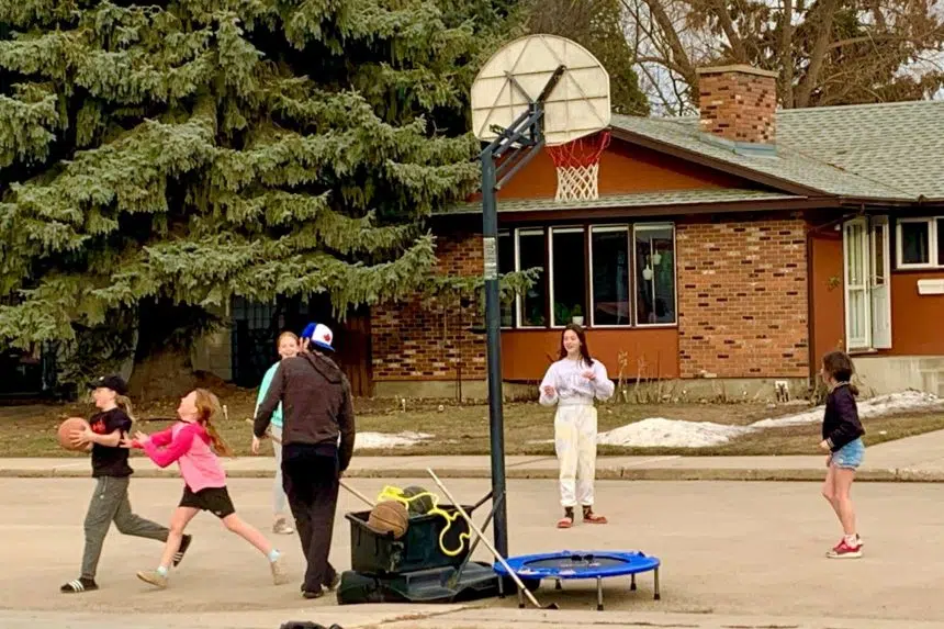 City of Saskatoon requests man to remove basketball net from street