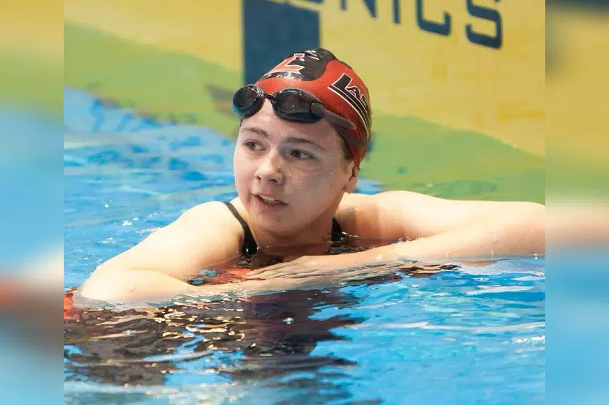 Para swimmer trades graduation stage for world stage to win gold