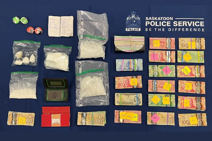 Man and woman arrested with large amount of cash, drugs