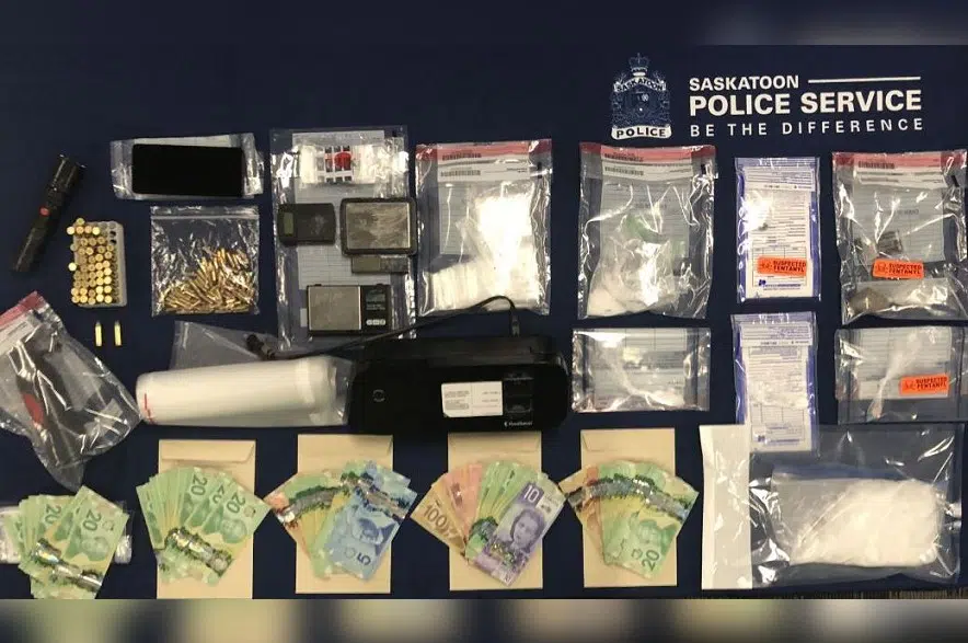 Saskatoon man facing charges after police seize drugs, weapons, cash