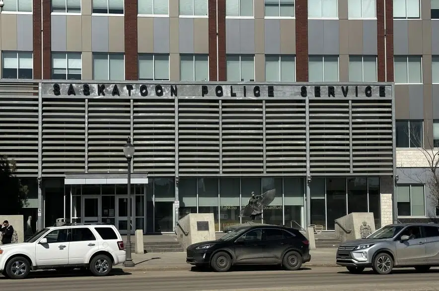 Saskatoon police say an officer was hurt while jailing a suspect