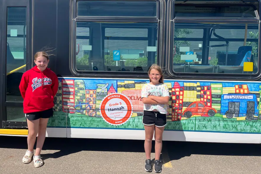 Students' artwork being displayed on the side of Saskatoon buses