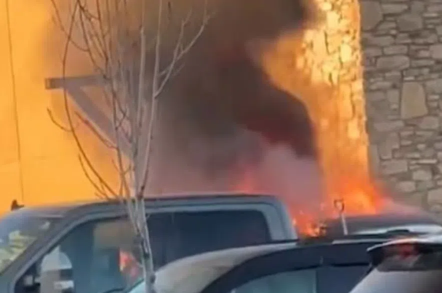 VIDEO: Fire crews battle car on fire in Cabela's parking lot