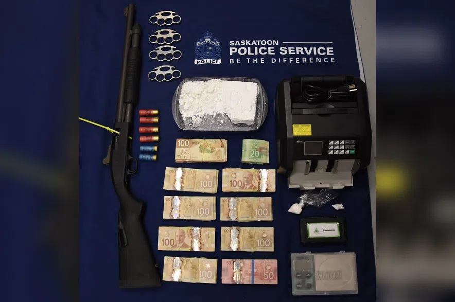 Police seize cocaine, cash, vehicles and weapons during warrant searches